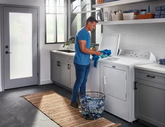 man doing laundry